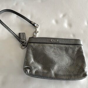 Coach, silver , small clutch with small pocket inside.  Excellent condition.
